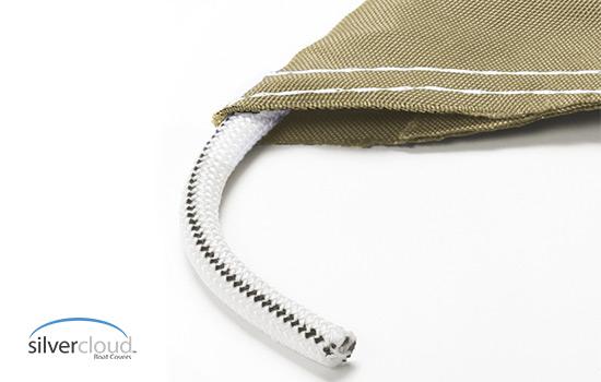 Heavy duty shock cord sewn into the hem
